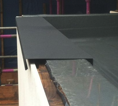 Metal capping detail during on-site installation