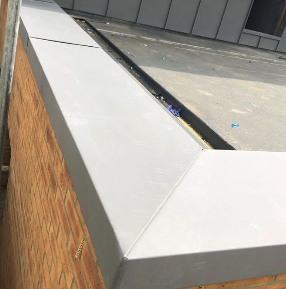 Aluminium wall capping close-up showing precision fold detail